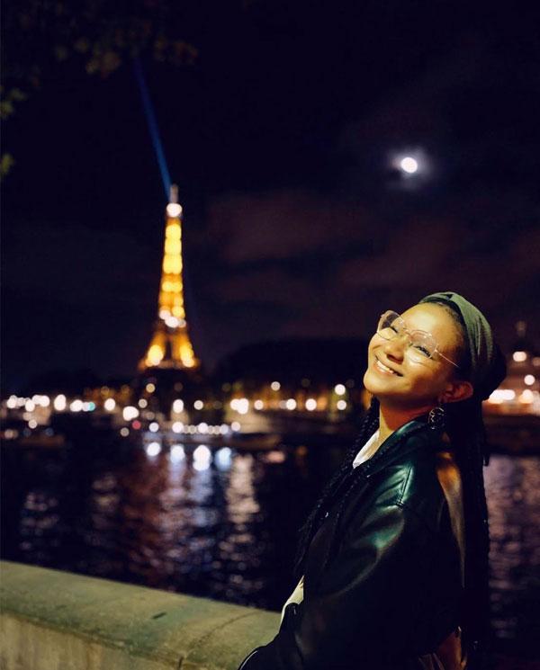 Pallas in front of lit up Eiffel Tower at night